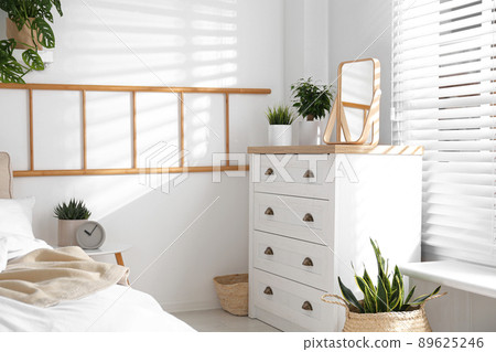 White chest of drawers in beautiful bedroom. Interior design 89625246