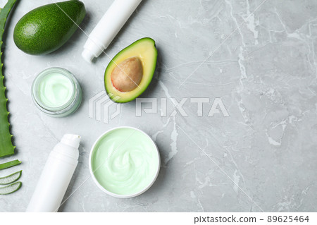Flat lay composition with jars of cream on marble background. Space for text Flat lay composition with jars of cream on marble background. Space for text 89625464