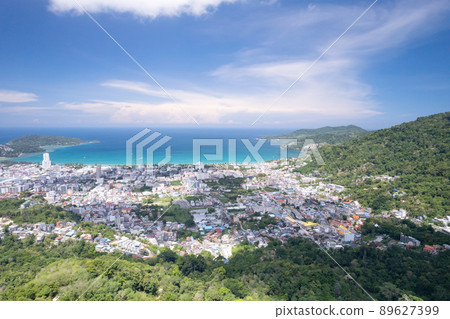 Phuket Thailand patong bay. Panorama landscape nature view from Drone camera. Aerial view of patong city in phuket thailand. Beautiful sea in summer sunny day time Phuket Thailand patong bay. Panorama landscape nature view from Drone camera. Aerial view of patong city in phuket thailand. Beautiful sea in summer sunny day time 89627399