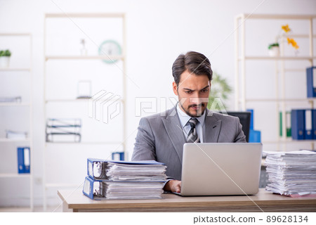 Young businessman employee working in the office Young businessman employee working in the office 89628134