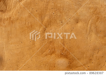 Clay wall texture and background from clay house.The house walls are made from clay. Clay wall texture and background from clay house.The house walls are made from clay. 89628387