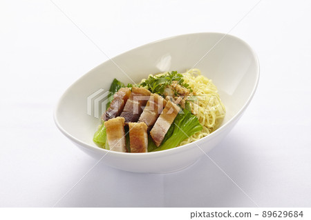 egg noodles with BBQ pork  and vegetable isolated on white background, Asian food style. 89629684