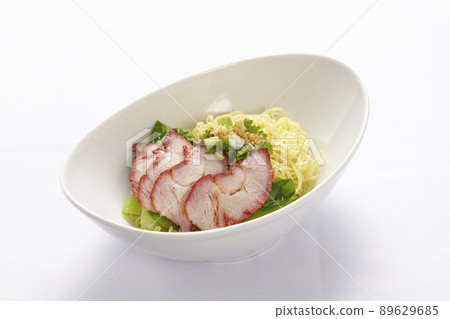 egg noodles with BBQ pork  and vegetable isolated on white background, Asian food style. 89629685