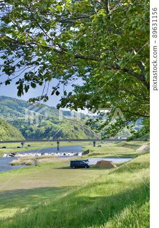 Spring: Enjoy camping at the riverbed at the foot of Gassantoda Castle Spring: Enjoy camping at the riverbed at the foot of Gassantoda Castle 89631156