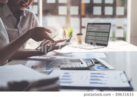 Group of IT consultant working by digital tablet and management big data and analyze financial document of company. 89631633