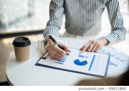 Group of Business people and Accountant checking data document on digital tablet for investigation of corruption account . Anti Bribery concept. Group of Business people and Accountant checking data document on digital tablet for investigation of corruption account . Anti Bribery concept. 89631968
