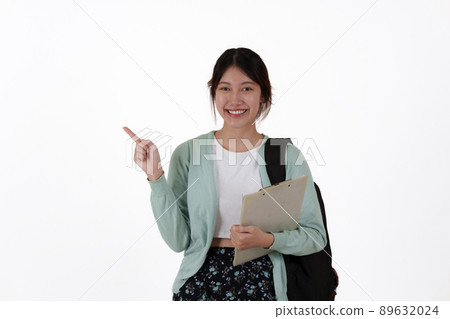 Young college student with backpack isolated over white background. E-learning ,online ,education concept. Young college student with backpack isolated over white background. E-learning ,online ,education concept. 89632024