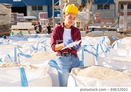 Female worker in outdoor warehouse 89632601
