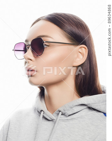 Beautiful woman in sunglasses. beauty girl in trendy Glasses Beautiful woman in sunglasses. beauty girl in trendy Glasses 89634868
