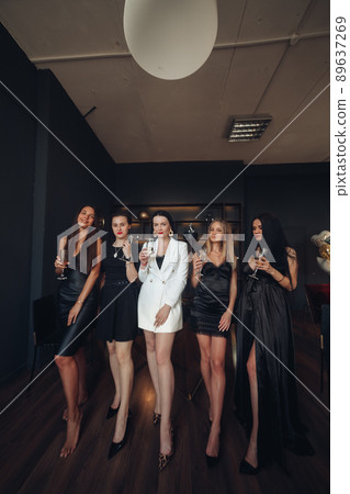 Group of fashion young sexy woman enjoying playing 89637269