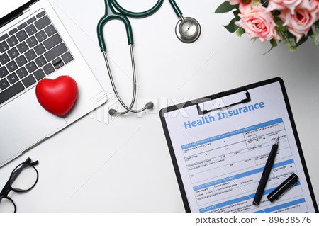 Stethoscope, medical report and laptop on white background. Healthcare Concept. Stethoscope, medical report and laptop on white background. Healthcare Concept. 89638576