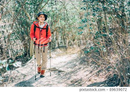 Climbing trekking woman 89639072