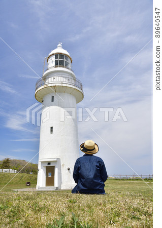 Photographing the scenery of Cape Esan Lighthouse Park with women at Cape Esan, Hakodate City, Hokkaido in the spring Photographing the scenery of Cape Esan Lighthouse Park with women at Cape Esan, Hakodate City, Hokkaido in the spring 89640547