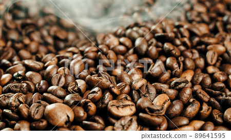 High Quality coffee production with coffe beans and smoke in oven 89641595