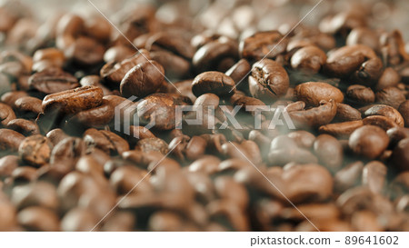 High Quality coffee production with coffe beans and smoke in oven High Quality coffee production with coffe beans and smoke in oven 89641602