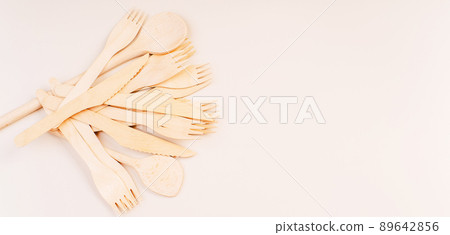 Banner eco friendly disposable kitchenware utensils on white background.Wooden forks,spoons,zero waste.Copy space.Eco friendly wooden cutlery.plastic free concept.Disposable wooden cutlery.Eco concept Banner eco friendly disposable kitchenware utensils on white background.Wooden forks,spoons,zero waste.Copy space.Eco friendly wooden cutlery.plastic free concept.Disposable wooden cutlery.Eco concept 89642856