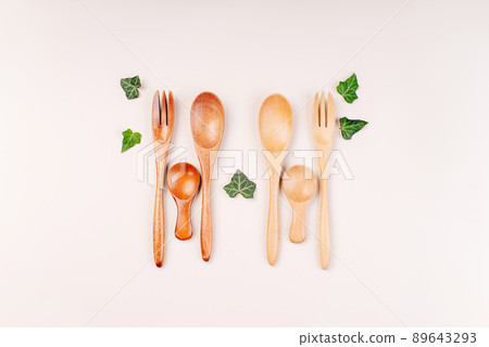 Set of eco friendly bamboo eating ,wooden cutlery.Zero waste traveling set.Wooden cutlery for reusable use.Environmental protection concept.made of natural materials.Plastic free.Sustainable lifestyle Set of eco friendly bamboo eating ,wooden cutlery.Zero waste traveling set.Wooden cutlery for reusable use.Environmental protection concept.made of natural materials.Plastic free.Sustainable lifestyle 89643293