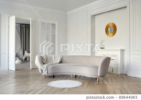 Spacious living room with elegant furniture and white walls 89644065