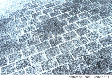 Light snow brick sidewalk Light snow brick sidewalk 89644581