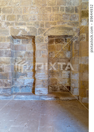 Recessed frame (Niche) in an old stone bricks wall 89644932