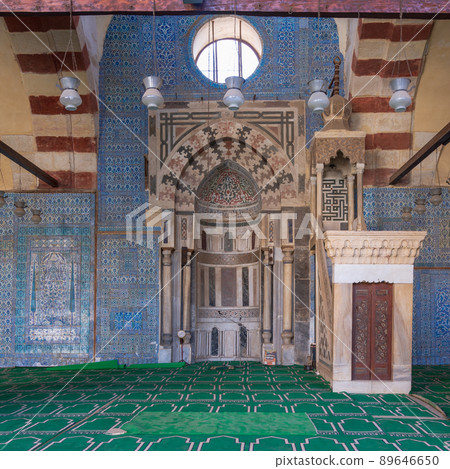 Blue ceramic tiles, Engraved Mihrab (niche) and decorated marble Minbar (Platform), Mosque of Aqsunqur (Blue Mosque), Cairo, Egypt Blue ceramic tiles, Engraved Mihrab (niche) and decorated marble Minbar (Platform), Mosque of Aqsunqur (Blue Mosque), Cairo, Egypt 89646650