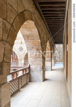 Arch with wooden balustrades, caravansary (Wikala) of al-Ghuri, Cairo, Egypt Arch with wooden balustrades, caravansary (Wikala) of al-Ghuri, Cairo, Egypt 89646668