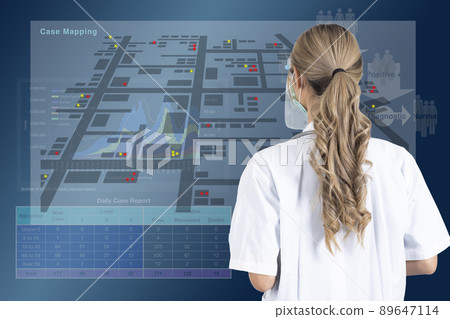 Female doctor watching epidemiological data projected in front of her. 89647114