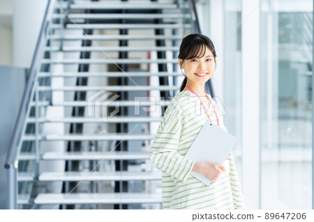 A young female engineer in the office 89647206