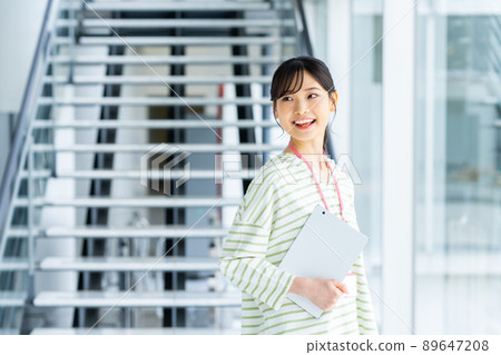 A young female engineer in the office 89647208