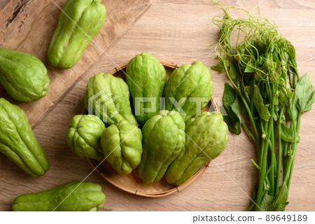Chayote squash fruit and leaf on wooden background, Organic vegetables from local market 89649189