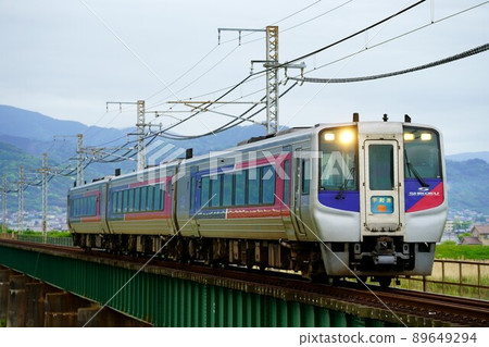 Limited express Uwakai crossing the Shigenobu River Bridge 89649294