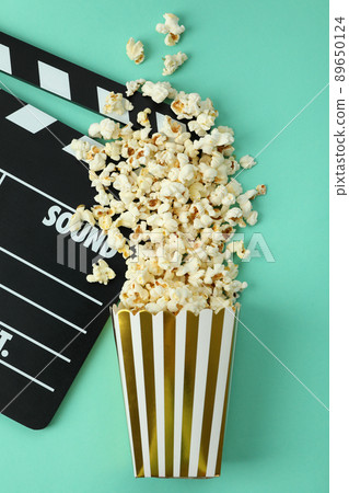 Concept of cinema accessories on yellow background 89650124