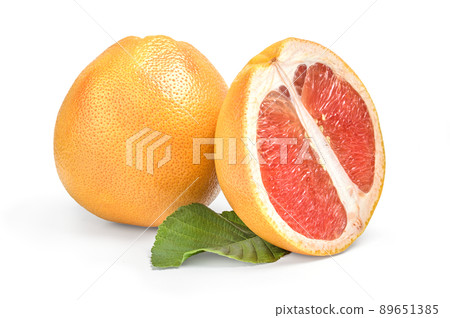 Grapefruit with half and green leaf isolated on white background Grapefruit with half and green leaf isolated on white background 89651385