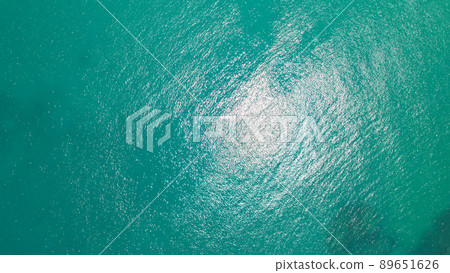 Top view of the turquoise water. Like a background Top view of the turquoise water. Like a background 89651626