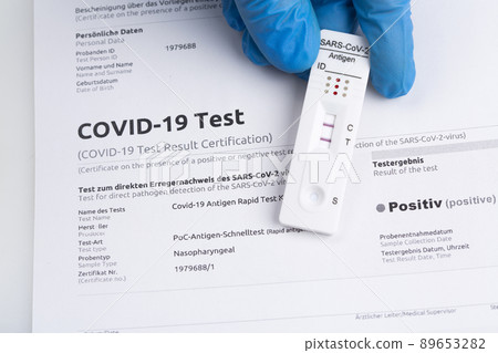 Positive test result by using rapid test device for COVID-19. Positive test result by using rapid test device for COVID-19. 89653282