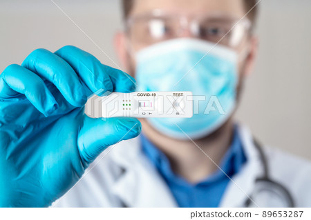 Positive test result by using rapid test device for COVID-19. 89653287