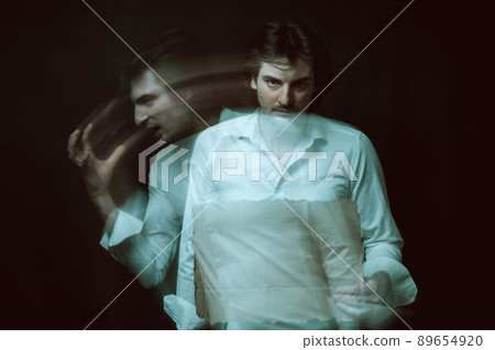 schizophrenic blurred portrait of a psychopathic man with mental disorders and disorders 89654920