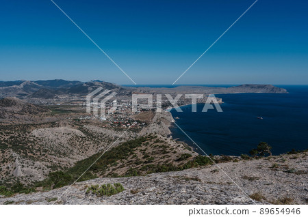 View of the ancient city of Sudak and the Genoese fortress on the Black Sea coast in Crimea View of the ancient city of Sudak and the Genoese fortress on the Black Sea coast in Crimea 89654946