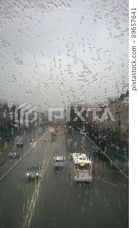 Snow melts on the glass view of the road Snow melts on the glass view of the road 89657641