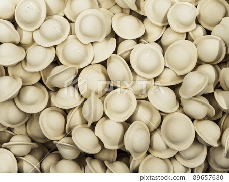 Frozen meat dumplings in the freezer in the store Frozen meat dumplings in the freezer in the store 89657680