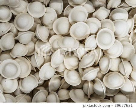 Frozen meat dumplings in the freezer in the store Frozen meat dumplings in the freezer in the store 89657681