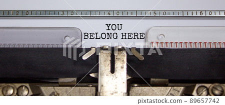 You belong here symbol. Words 'You belong here' typed on retro typewriter. Diversity, inclusion, belonging and you belong here concept. Copy space. You belong here symbol. Words 'You belong here' typed on retro typewriter. Diversity, inclusion, belonging and you belong here concept. Copy space. 89657742