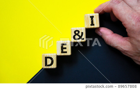 DEI, Diversity, equity and inclusion symbol. Concept words DEI, diversity, equity and inclusion on wooden cubes on beautiful black background. Business, DEI, diversity, equity and inclusion concept. 89657808