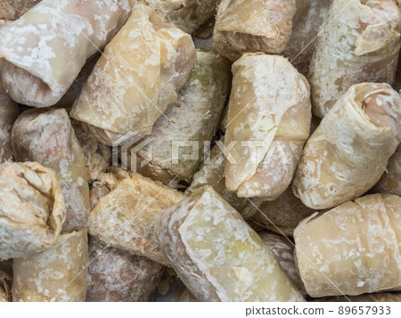 Frozen cabbage rolls in the refrigerator in the store Frozen cabbage rolls in the refrigerator in the store 89657933