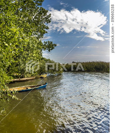 old wooden boats on the lake old wooden boats on the lake 89660288