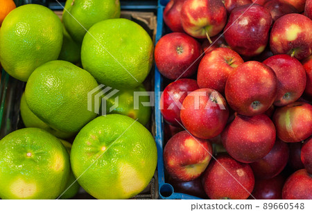Fruit market with various colorful fresh fruits and vegetables Fruit market with various colorful fresh fruits and vegetables 89660548