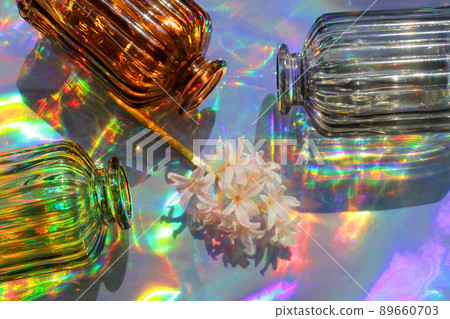 Glassware vases reflect sunlight shadow effect. Play of shadows and sunlight. Glassware vases reflect sunlight shadow effect. Play of shadows and sunlight. 89660703
