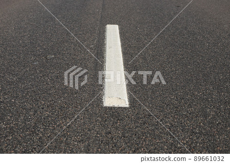 Asphalt road with single solid white line road marking Asphalt road with single solid white line road marking 89661032