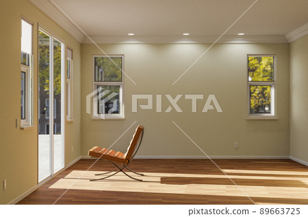 Empty Chair Sitting on the Floor Facing Glass Door in Empty Room of House with Blank Wall. Empty Chair Sitting on the Floor Facing Glass Door in Empty Room of House with Blank Wall. 89663725