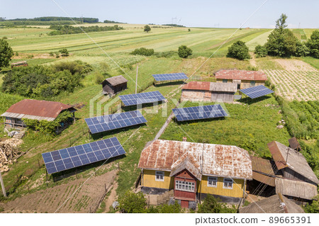 Aerial view of solar panels in rural country area. Aerial view of solar panels in rural country area. 89665391